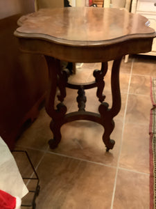 Flaming Mahogany Empire Scalloped Parlor Table